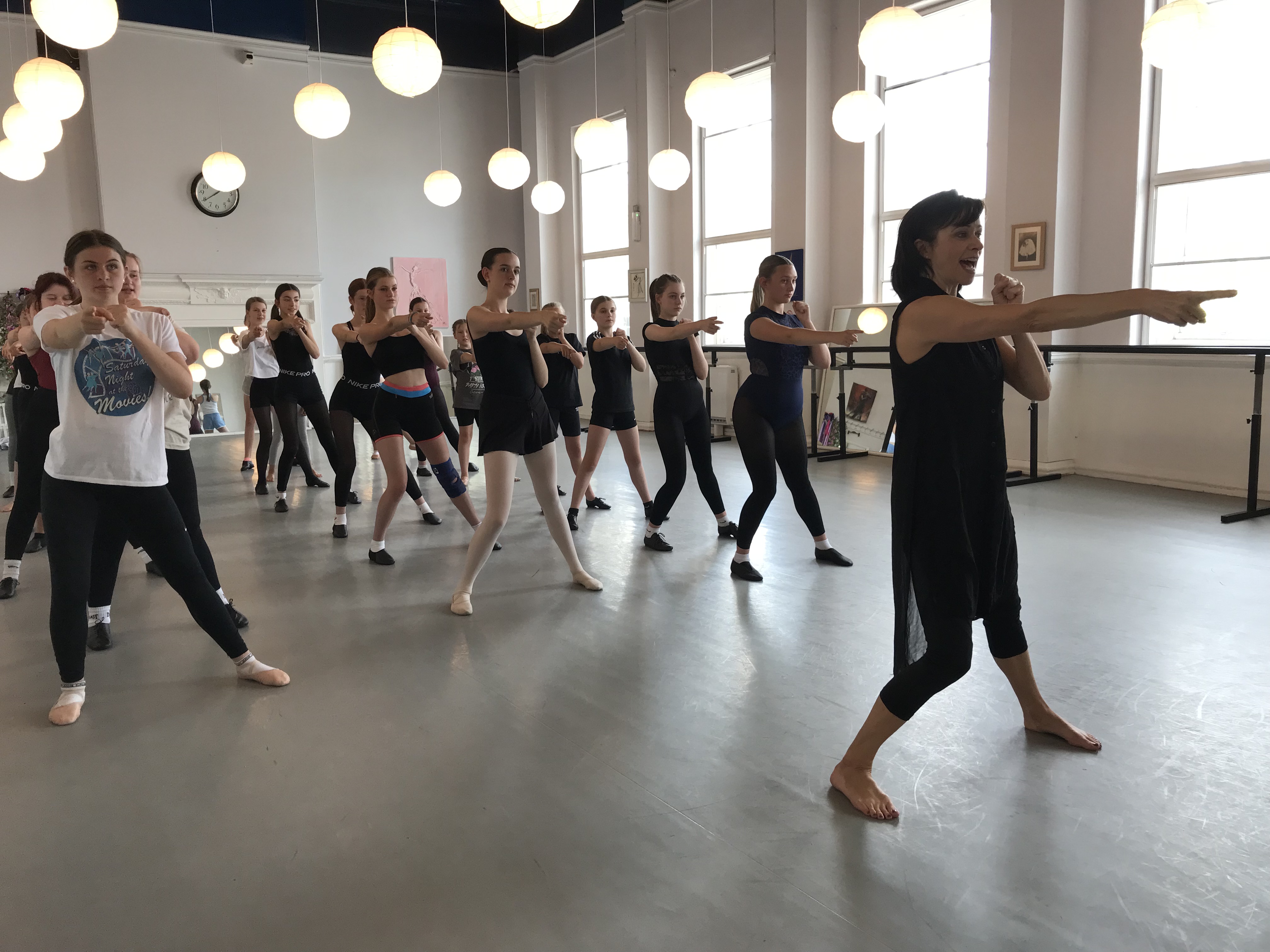 Students working with Helen Anker during a Mamma Mia workshop